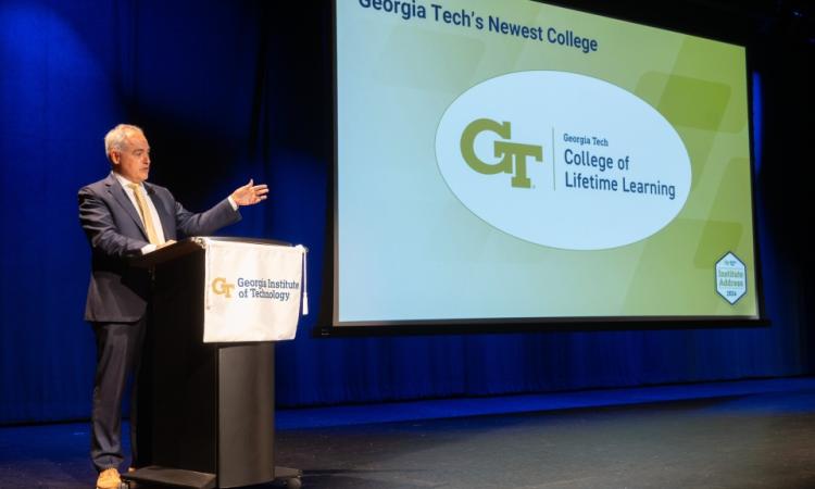 President Cabrera speaking during the Institute Address with the logo of the College of Lifetime Learning