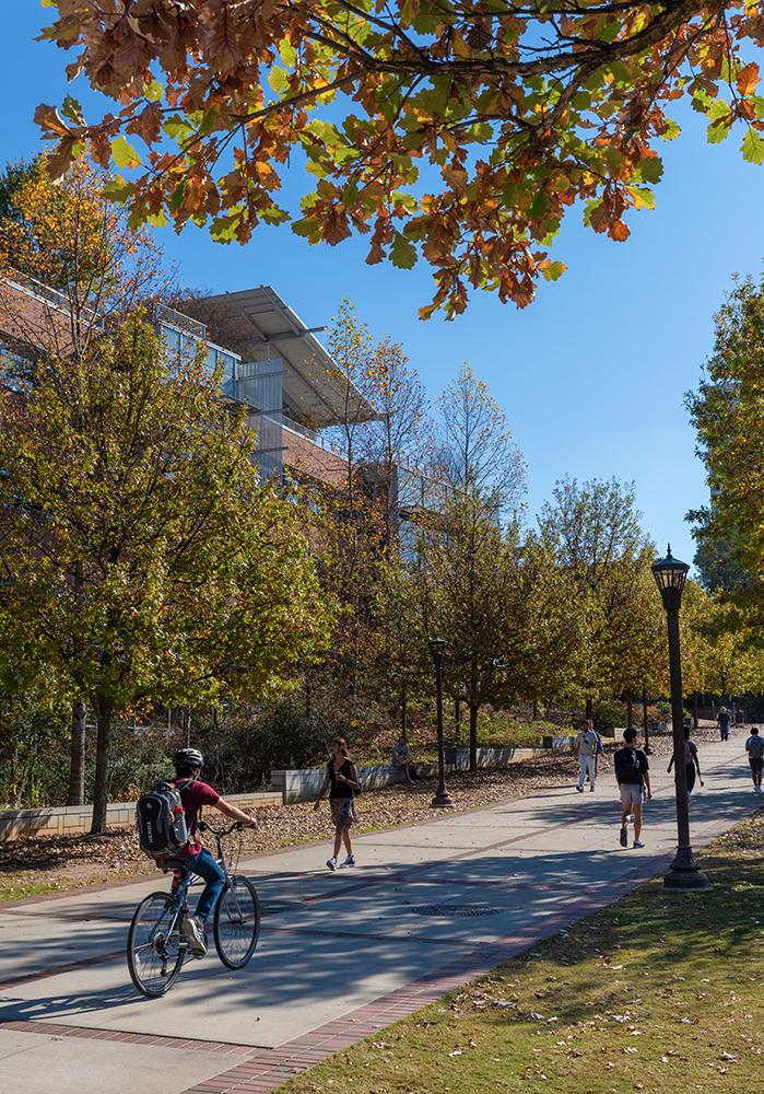 Students walking on the Georgia Tech campus on a fall day.