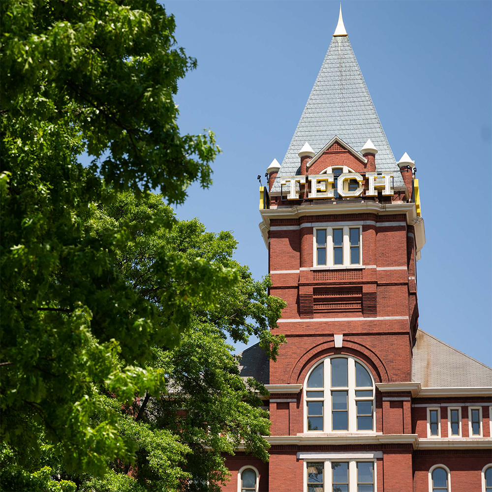 View of Tech Tower with a tree on its left side.